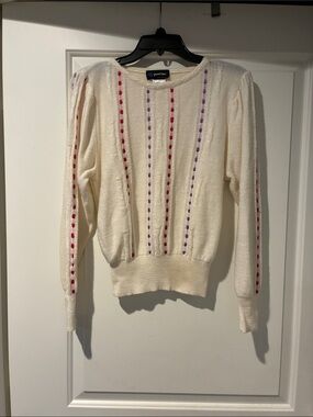 Cream Crewneck Sweater LSwith Pink & Purple  ribbons throughout front & sleeves.